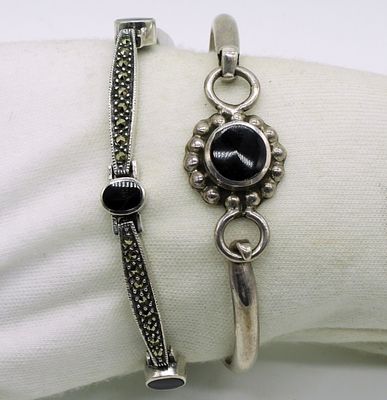 Two Black Onyx Sterling Bracelets. Two black onyx, sterling silver bracelets. Bangle is Taxco 