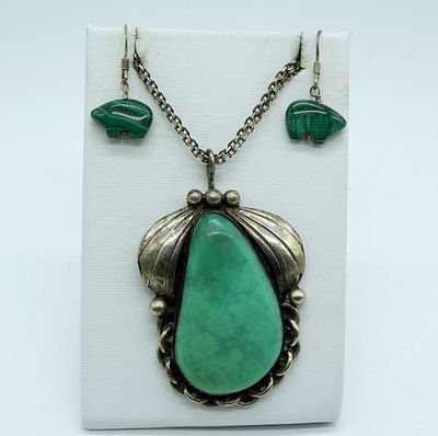 Sterling Pendant with Unidentified Green Stone. Gorgeous vintage / antique sterling pendant with 