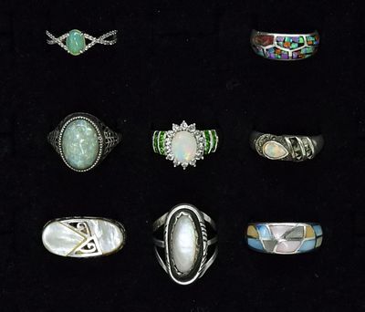 Opal & Mother of Pearl Sterling Rings. Eight sterling rings with opal and mother of pearl 