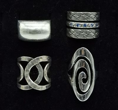 Four Simple Sterling Fashion Rings. Four simple sterling fashion rings. Sizes 7 & 8. (20 dwt)
