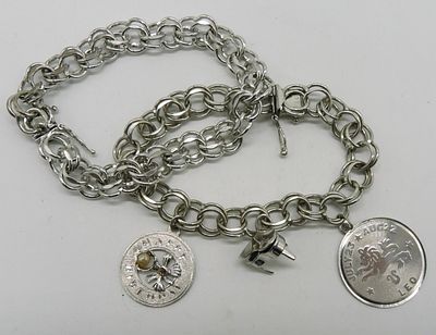 2 Vintage Sterling Charm Bracelets & 3 Charms. Two vintage sterling charm bracelets, 7.5" long. 
