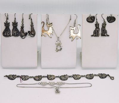8 Sterling Cat Pieces of Jewelry. Eight sterling pieces of cat shaped jewelry. Two bracelets, 7" 
