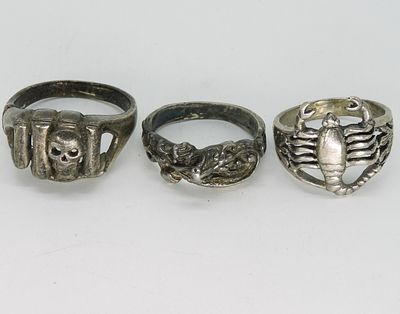 3 Sterling Mens Rings. Three sterling mens rings, skull, size 13. Dragon, size 10. Scorpion 
