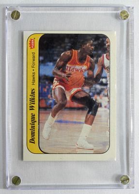 Dominique Wilkins Fleer #11. In a case. In good condition