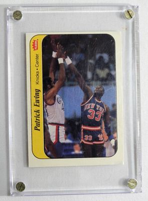 Patrick Ewing Fleer #6. In a case. In good condition