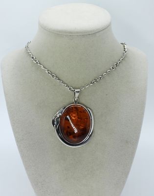 Large Amber 925 Necklace. Large Amber gemstone in sterling with pretty floral design. Pendant is 
