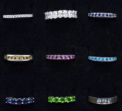 9 Sterling Gemstone Bands. Nine sterling gemstone bands, sizes 6, 7, 8. (14 dwt)