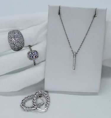 Simulated Diamond 925 Rings & More. Simulated diamond sterling rings, necklace and pierced 
