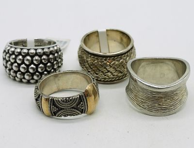 4 Intricate Sterling Rings with Tags. Four intricate sterling rings, two new with tag. Sizes 