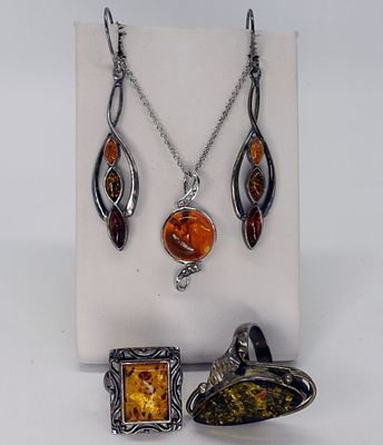 Vintage & Modern Amber Sterling Jewelry. Two sterling vintage rings with Amber gemstones, sizes 