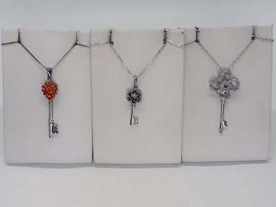 3 Sterling Skeleton Key Necklaces. Three sterling skeleton key shaped necklaces. Pendants are 1 
