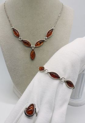 3 Piece Sterling Amber Gemstone Set. Sterling amber gemstone set. Necklace is 20" long. Bracelet 