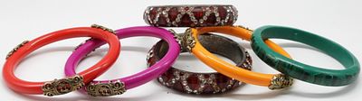 (6) Color Bracelets. vintageauctionsonline.com