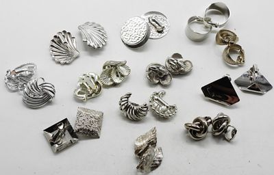 (12) Pair Silver Tone Clip On Earrings. Bid With Us Today