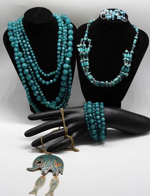 Turquoise Colored Lot. (3) Necklaces (1) Bracelet (1) Pair of earrings