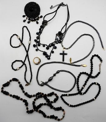 Black Beads & Clear Rhinestones. (6) Necklaces (1) Brooch (1) Ring sized:6.5