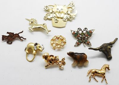 (10) Animal Brooches. If you love animals and brooches, this is your lot. Butterfly as a uranium 