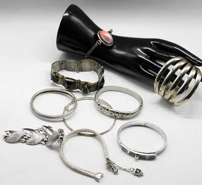 (10) Silver-Tone Bracelets. Check out our very own brand-new web site. Vintageauctionsonline.com
