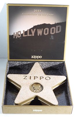 2001 Zippo Hollywood's Leading Light Unfired. Comes in its original box and tin case. Unfired.