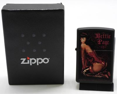 Bettie Page Pinup Girl Zippo Sealed 2011. Sealed, 2011. Black matte. In a box