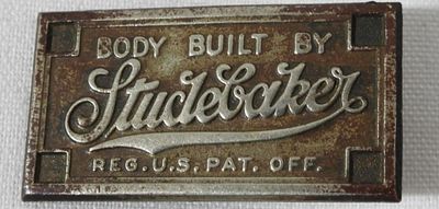 Studebaker Dashboard Emblem. Body Built By Studebaker