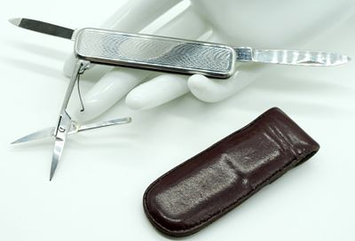 Solingen R Rostfrei Pocket Knife. Three tool knife. Has scissors, and comes with a leather sheath