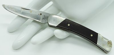 Buck 504 Lock-Back Pocket Knife. Used. Wood and silver handle