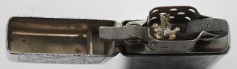 1975 Zippo Slim Venetian Pattern Unfired. Unfired. The engraved spot is engraved with "E A". Image - 3
