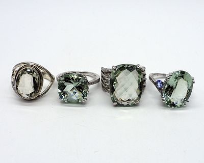 Four Sterling Green Amethyst Rings. Four sterling Green Amethyst fashion rings. Sizes 8 & 10. 