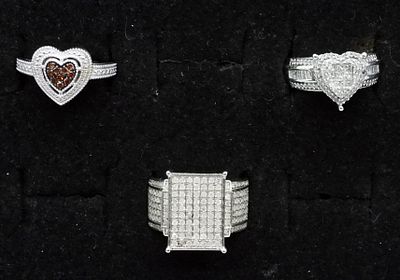3 Red and White Diamond Sterling Rings. Three sterling rings with Red and White Diamonds. Red 