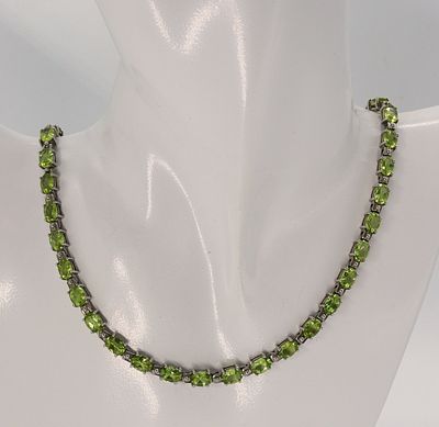 Peridot Sterling Necklace. Peridot sterling necklace, 17" long. Clasp works. (19 dwt)