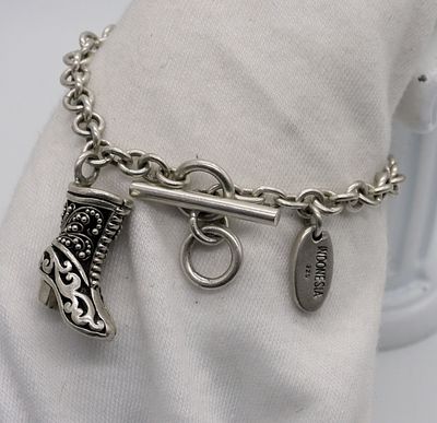 Lois Hill Sterling Boot Bracelet. Lois Hill, sterling boot bracelet with toggle clasp, 8" long. 