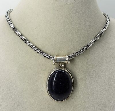 Blue Goldstone Pendant & Wheat Chain. Blue Goldstone sterling pendant, 2" long. On a sterling 