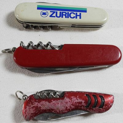 Victorinox Swiss Army Knife Lot (3). 2 Victorinox Swiss Army knives plus 1 unknown brand 