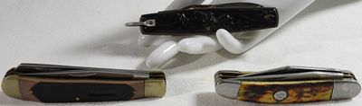 Pocket Knife Collection, Three Pieces. The collection includes one unidentified multi-blade 
