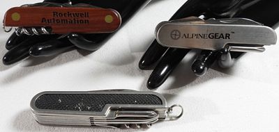Multi-Tool Lot - Alpine Gear & Rockwell. Collection of three Swiss Army-style multi-tools 