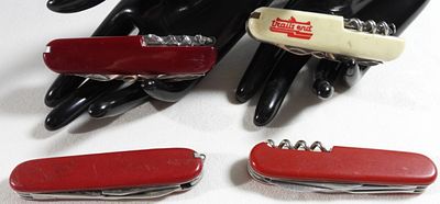Swiss Army Knife Collection, Multi-Tool Lot. Collection of four multi-tool knives, including one 
