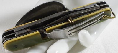 Vintage Multi-Tool Camp Knife w/ Utensils. This unique vintage folding camp knife features 