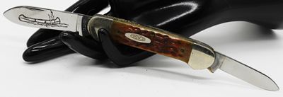 Case XX Canoe, Amber Bone Handle. This Case XX folding canoe knife features amber bone handle 