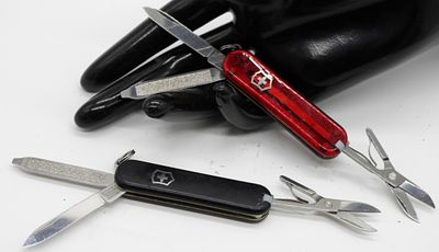 Victorinox Swiss Army Knife Lot - Red & Black. Two vintage Victorinox Swiss Army knives 