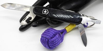 Victorinox Officer Suisse Multi-Tool, Black Handle. Classic Swiss Army knife featuring black 
