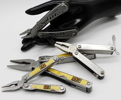 Multi-Tool Collection, Various Brands. Collection of folding multi-tools, including pliers 