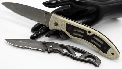 Gerber & Frost Cutlery Folding Knives. This lot includes one Gerber and one Frost Cutlery 