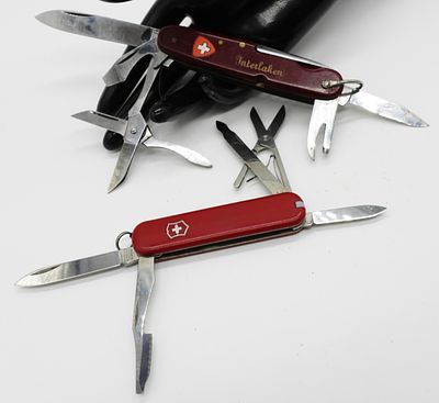 Vintage Swiss Army Knives, Rostnever & Victorinox. Lot includes one Rostnever multi-tool marked 