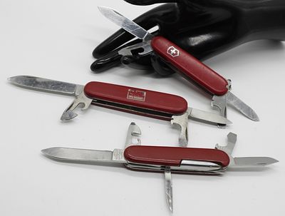 Victorinox Swiss Army Knife Collection, Red Handle. Collection of vintage Victorinox Swiss Army 