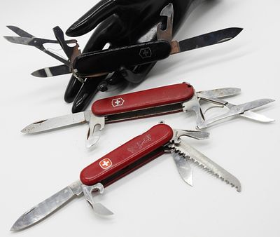 Swiss Army Multi-Tool Lot of 3 Knives. The collection includes two Victorinox Swiss Army knives 