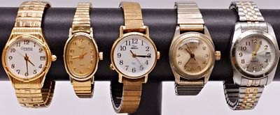 Five Vintage Stretch Band Watches. A collection of five vintage stretch band watches in gold 