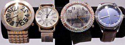 Lot of 4 Vintage Wristwatches with Mixed Bands. Four vintage wristwatches spanning different 