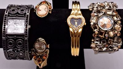 Vintage Cuff Watches Lot, Gold & Silver Tone. A collection of four vintage cuff watches in mixed 