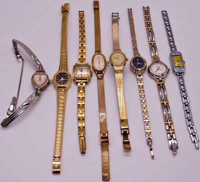 Lot of 8 Women's Gold and Silver-Tone Watches. Collection of eight women's dress watches 